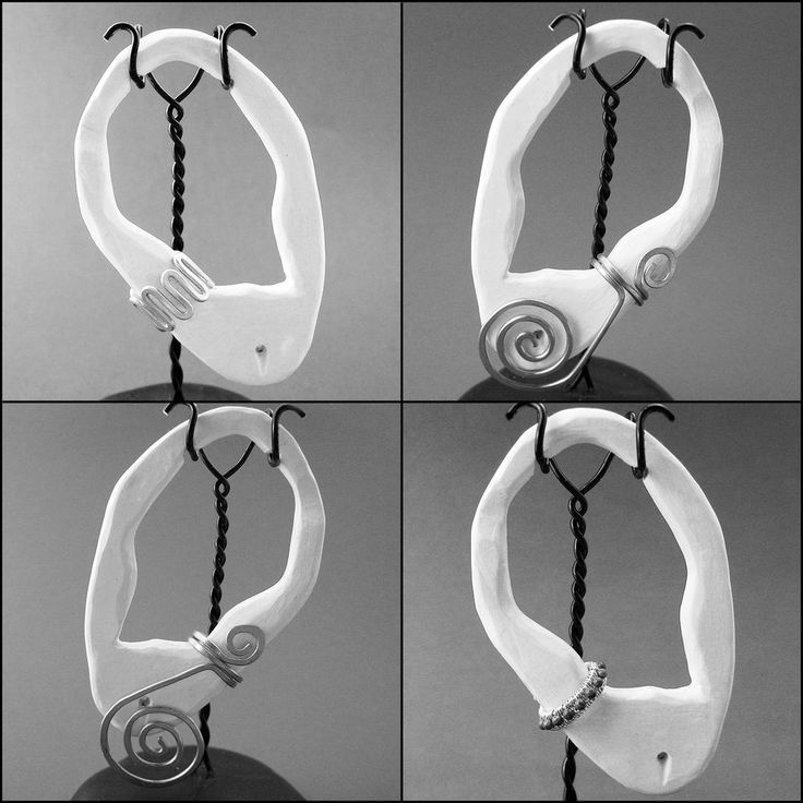 four pictures of different shapes and sizes of scissors hanging from strings with beads on them