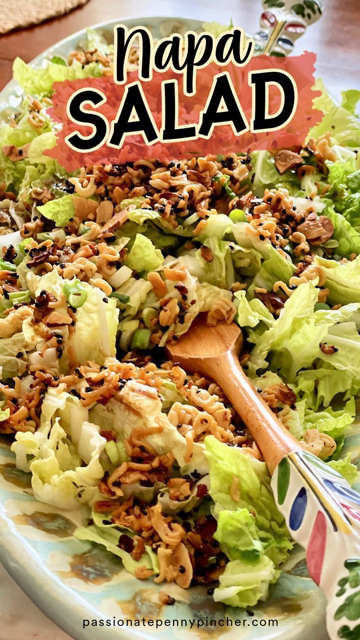 a salad with lettuce and walnuts on it