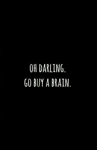 a black and white photo with the words, oh daring go buy a brain