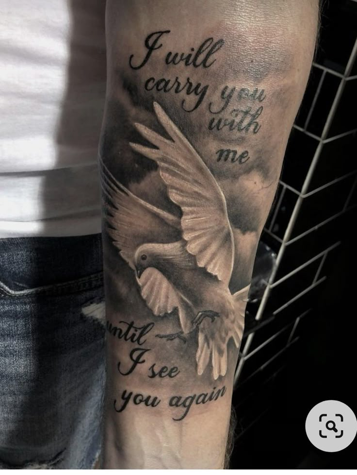 a man with a tattoo on his arm that says i will carry you with me