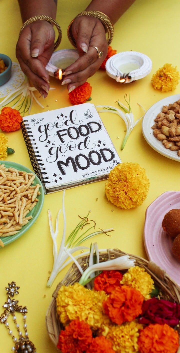 a table topped with plates and bowls filled with food next to a sign that says good morning