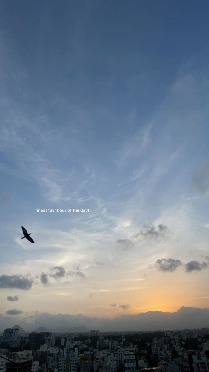 an airplane is flying in the sky over a city at sunset or dawn with a quote above it