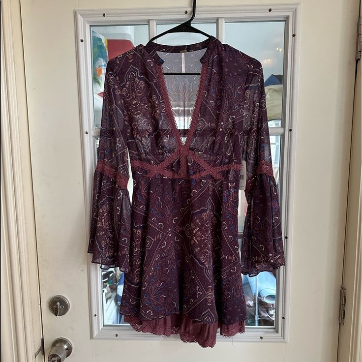 Free People Purple Paisley Mini Dress, Deep V Neck, Flare Sleeves Fall V-neck Mini Dress With Paisley Print, Fall Paisley Print V-neck Mini Dress, Paisley Print V-neck Party Dress, Flowy Mini Dress With Paisley Print, Flowy Paisley Print Mini Dress, Bohemian Mini Dress With Paisley Print For Fall, Casual Paisley Print Mini Dress For Party, Bohemian Paisley Print Mini Dress For Fall, Whimsical Goth