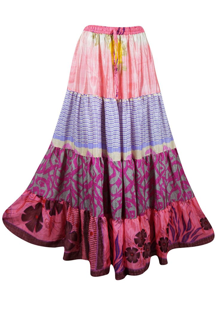 Embrace your free-spirited side with our Boho Chic Maxi Skirt, designed for the modern soul who loves to blend Multi Pink comfort and style. This flowing, maxi-length skirt features vintage-inspired tribal prints and earthy tones, perfect for creating a laid-back yet hippie-style look. Handcrafted with care, the skirt boasts tiered layers and subtle, giving it a graceful, gypsy flair. Whether you're strolling on the beach or attending a festival, this relaxed-fit statement skirt will flow effort Bohemian Lined Maxi Skirt For Vacation, Bohemian Vacation Lined Maxi Skirt, Bohemian Maxi Skirt For Vacation With Lined Skirt, Bohemian Patchwork Skirt For Vacation, Beach Patchwork Maxi Skirt, Pink Bohemian Maxi Bottoms, Pink Bohemian Maxi Length Bottoms, Bohemian Pink Maxi Bottoms, Patchwork Maxi Skirt For Beach