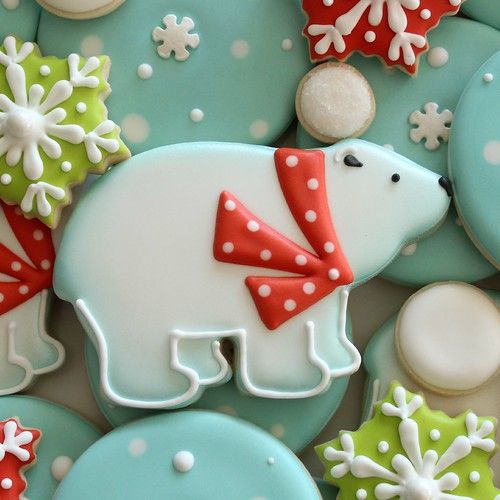 decorated cookies in the shape of polar bears and snowflakes