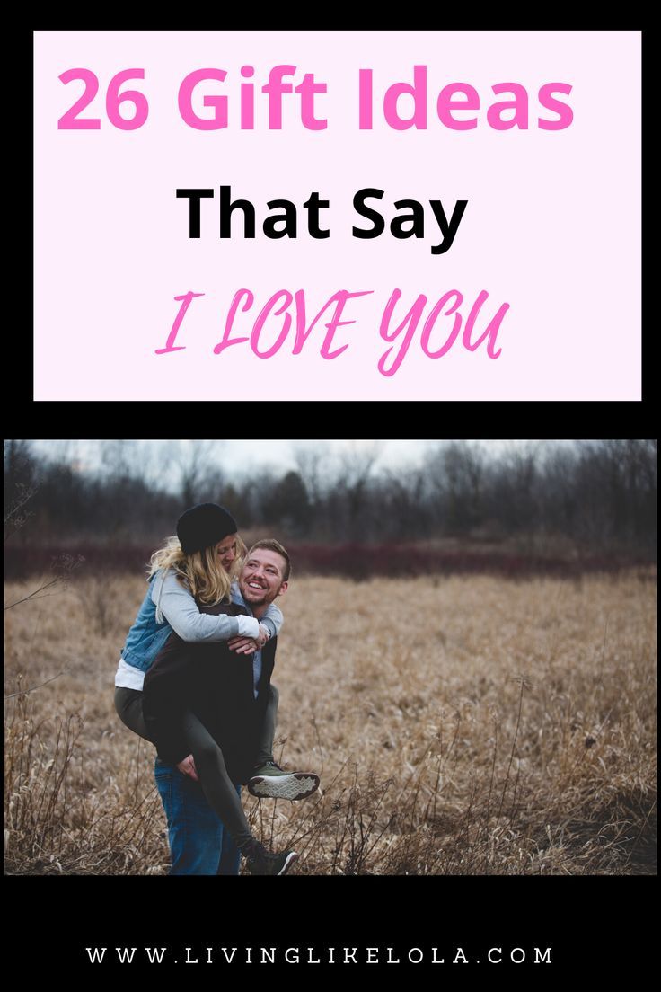 a couple hugging each other in a field with the words 26 gift ideas that say i love you