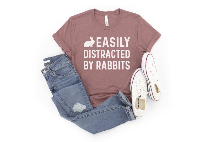 PLEASE READ BEFORE BUYING A UNISEX SHIRT YOU WILL LOVE: This funny rabbit shirt is the perfect tee for any bunny lover.  This shirt also makes a great gift as it is both personal and functional. It is something the person can frequently use and can be gifted for a variety of occasions.  Make sure to grab it early to get it in time. Each t-shirt is made to order and ships from the USA.  T-SHIRT DETAILS Our premium unisex t-shirts are super SOFT, COMFY, and LIGHT with just the right amount of stretch. We are sure you'll LOVE how these shirts feel. The unisex size fits well for most women but it's best to view the size chart image for exact t-shirt measurements.  Men typically order their normal size. However, men that like their shirts a little more loose fitting should order one size up.  * Education Shirts, Funny Rabbit, New Teacher Gifts, Rabbit Gifts, Rabbit Lover, Bunny Lovers, Bunny Shirt, Unisex Shirt, Really Cool Stuff