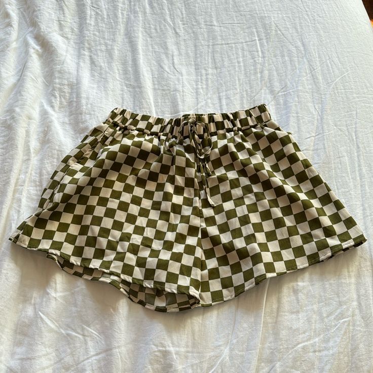 Olive Checkered Shorts. Brand New With Tags From The Brand Pretty Garbage Casual Plaid Pajama Shorts With Elastic Waistband, Trendy Plaid Shorts For Day Out, Plaid Short Summer Bottoms, Summer Plaid Short Length Bottoms, Casual Plaid Bottoms With Built-in Shorts, Plaid Short Length Summer Bottoms, Casual Plaid Shorts, Casual Plaid Pajama Shorts, Summer Plaid Bottoms With Elastic Waistband