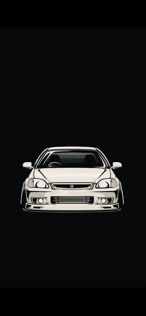 the front end of a white car on a black background