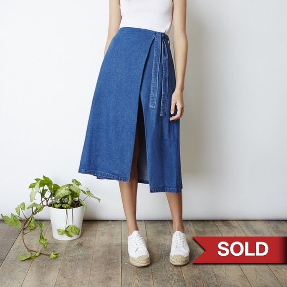 Brand New! Midi Wrap Skirt That Ties Up At The Waist With An Open Split In A Classic Blue Denim Fabric. Spring Day Out Dark Wash Denim Skirt, Cotton Mid-rise Denim Skirt For Day Out, Mid-rise Cotton Denim Skirt For Day Out, Spring Day Out Medium Wash Denim Skirt, Cotton Dark Wash Skirt For Day Out, Casual Indigo Denim Skirt In Cotton, Chic Blue Relaxed Fit Denim Skirt, Chic Blue Denim Skirt With Relaxed Fit, Casual Indigo Cotton Denim Skirt