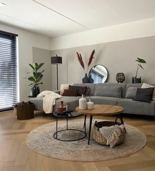 a living room filled with furniture and decor