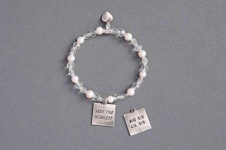 This is a great gift for your Big or Little Sis!  The reversible charm says "Seek the Noblest" on front and "Big Sis Lil Sis" on the back!  $24.99 Big Sis Lil Sis Gifts, Zta Sorority, Sorority Initiation, Lil Sis, Sorority Sisters, Big Sis, Crystal Beads Bracelet, Bead Bracelet, Charm Bracelets