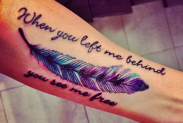 a woman's foot with a tattoo that says, when you life behind you be free