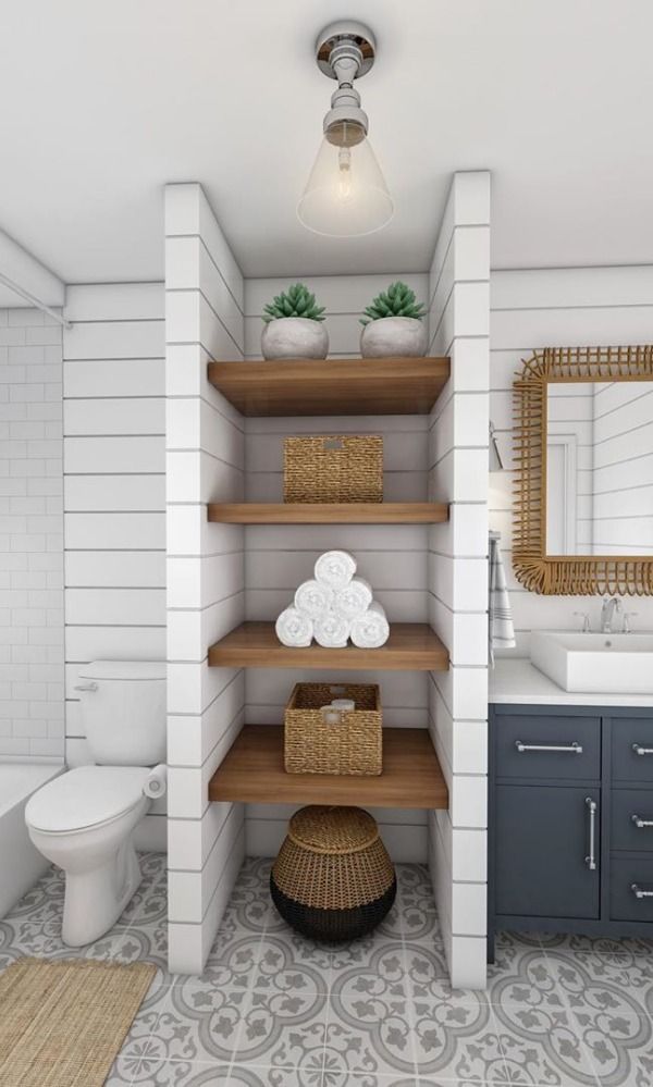 a bathroom with shelving, toilet and sink