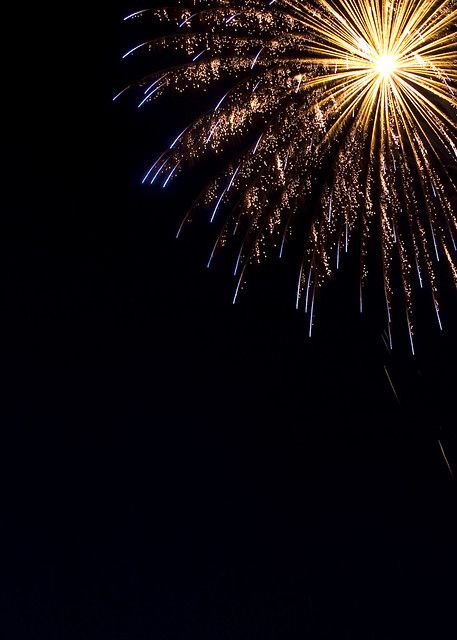 fireworks are lit up in the night sky