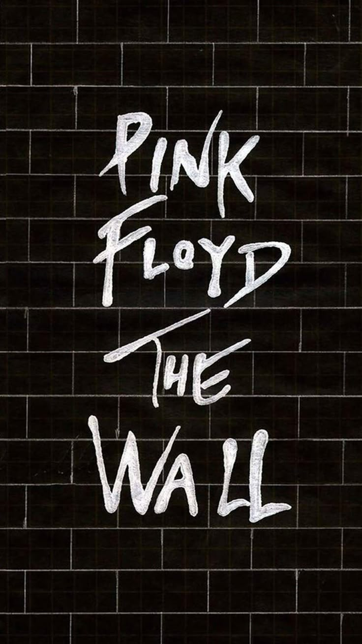 pink floyd the wall is written on a black brick wall with white writing that reads,'pink floyd the wall '