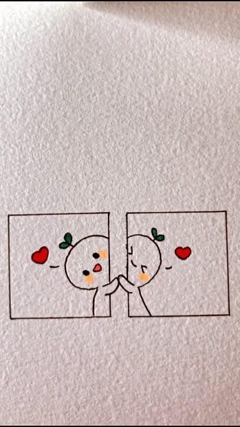 an image of two people touching each other's faces with hearts drawn on them