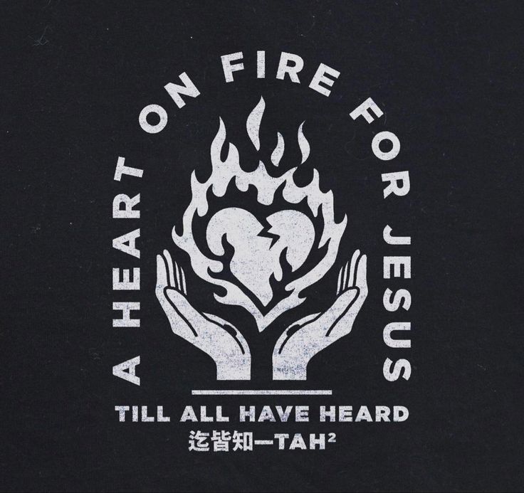 a black t - shirt with the words, heart on fire for jesus