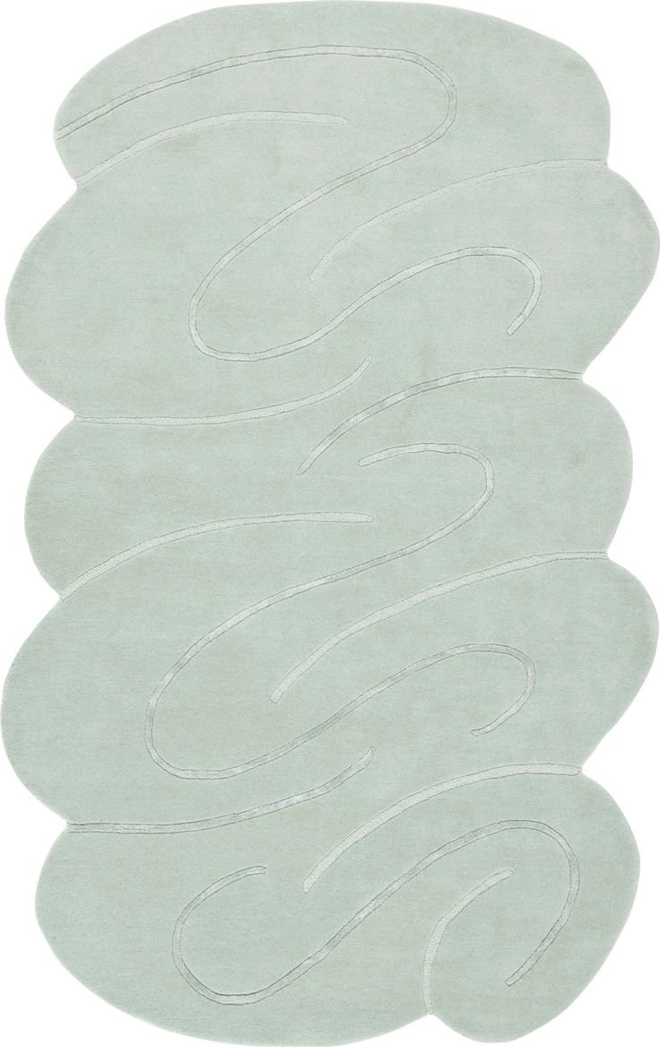 a white rug with wavy lines on it