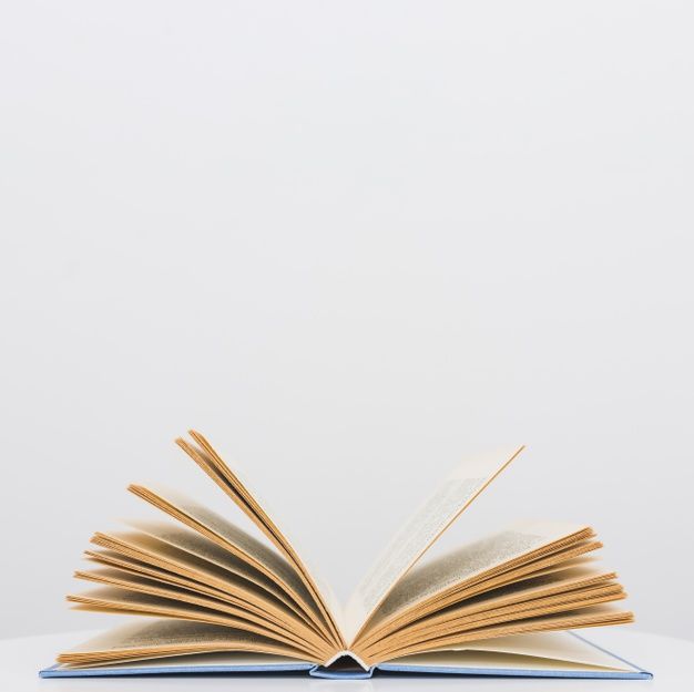 an open book sitting on top of a table