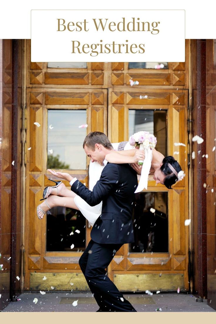 a man and woman are dancing in front of a door with confetti falling from it