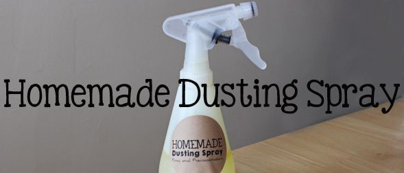 a bottle of homemade dusting spray sitting on top of a wooden table