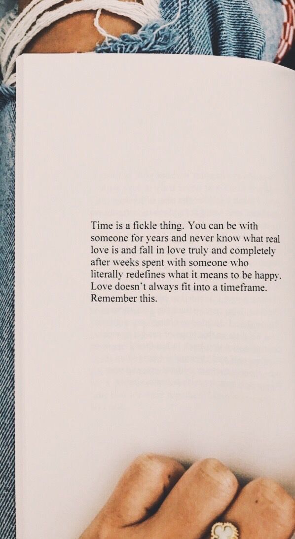 two hands holding an open book with the words time is reading you can be win someone for years and never know what real love is