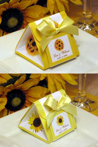 sunflowers are in the center of two small boxes