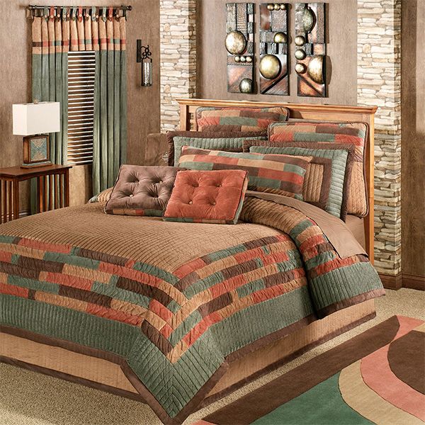 a bed room with a neatly made bed next to a window and rugs on the floor