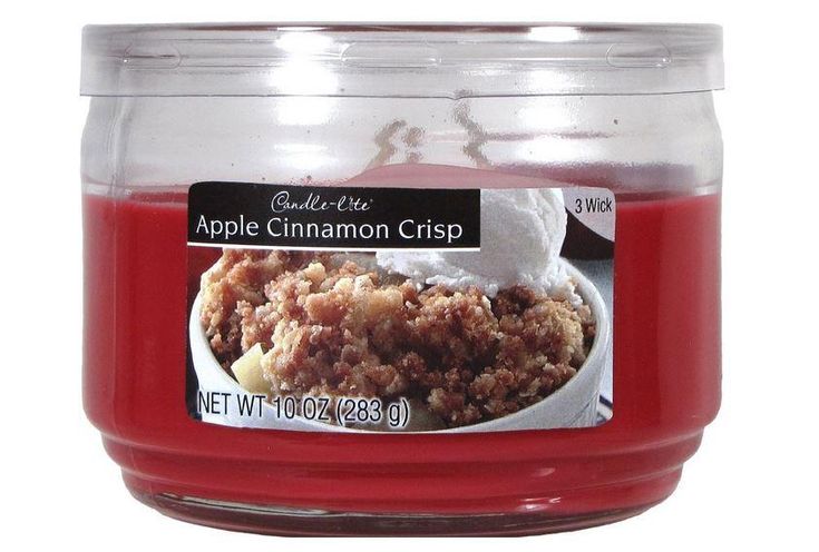 an apple cinnamon crisp jar is shown with the label on it's front and side