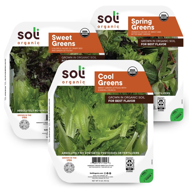 three bags of organic salad greens