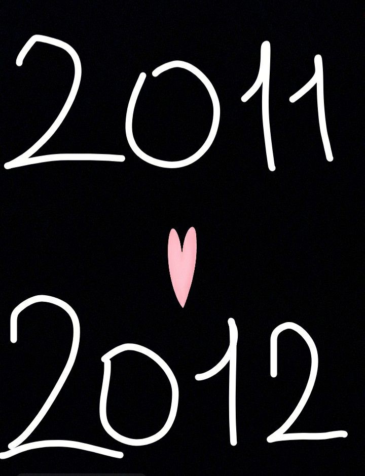 a black background with white writing and a pink heart in the middle that says 2012