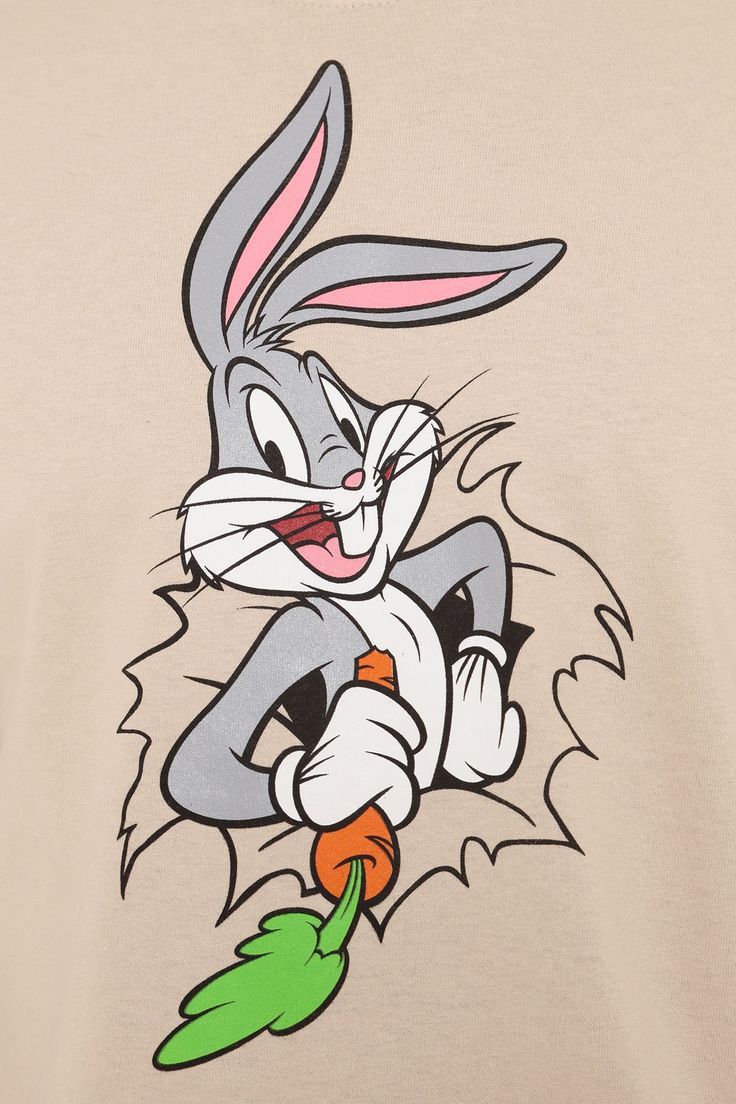 an image of a cartoon rabbit holding a carrot