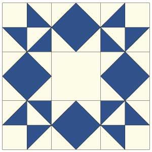 a blue and white quilt block with squares on it's sides, in the center