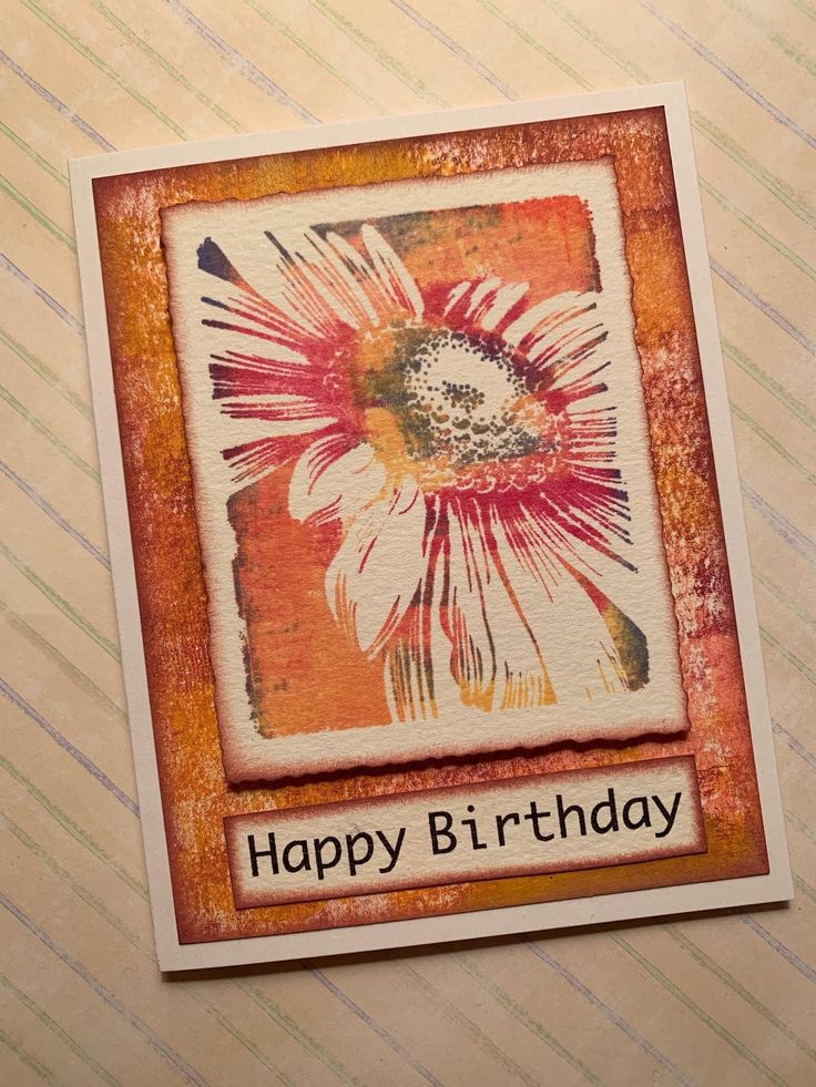 a happy birthday card with an image of a flower