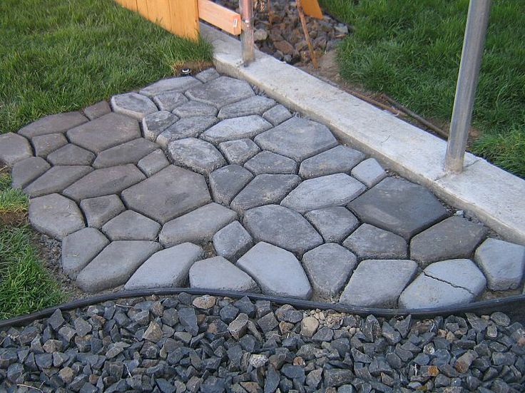 the steps are made out of cobblestone stones and then put into a potted planter