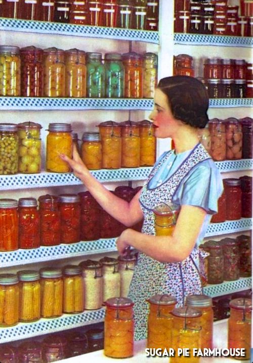 a woman standing in front of shelves filled with jars