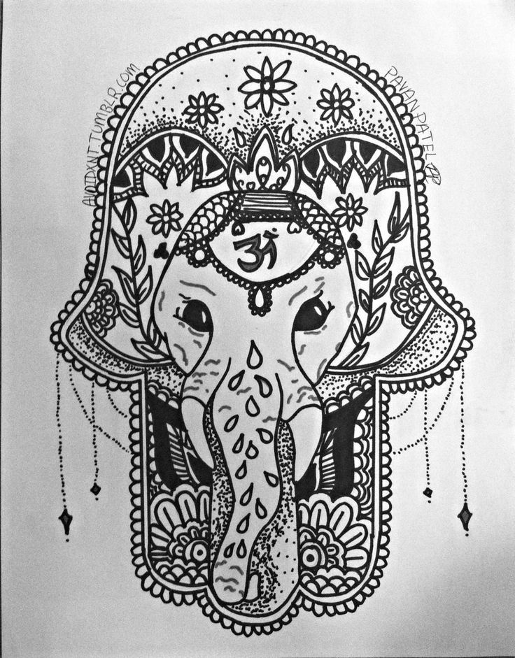 an elephant with ornate designs on it's head is shown in black and white