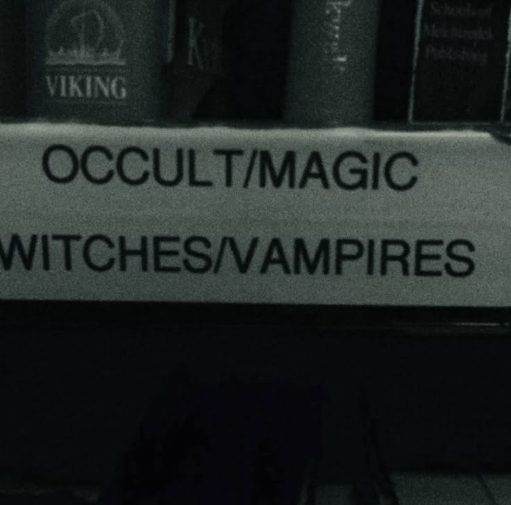 there is a sign that says occult / magic witches / vampires