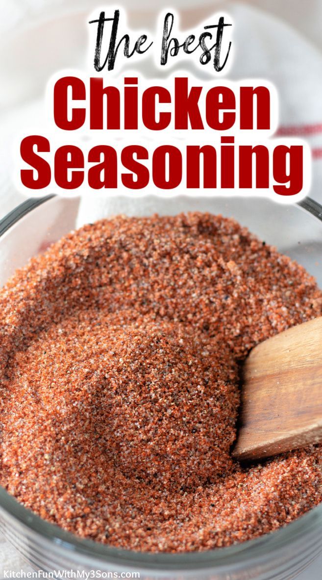 the best chicken seasoning recipe in a glass bowl with a wooden spoon on top