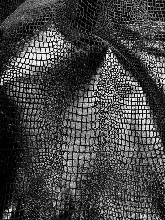 a black and white photo of a mesh bag