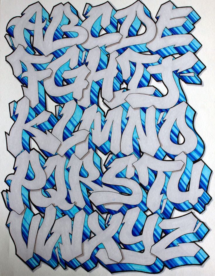 an image of graffiti written in blue and white