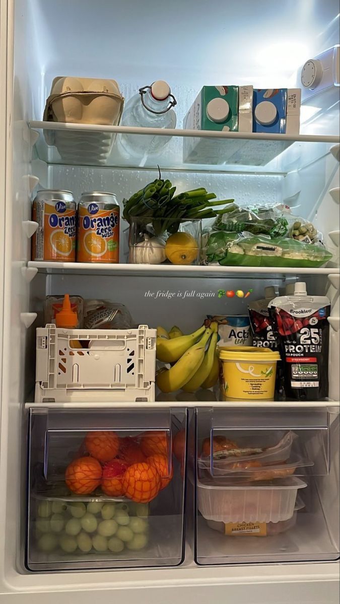 an open refrigerator filled with lots of food