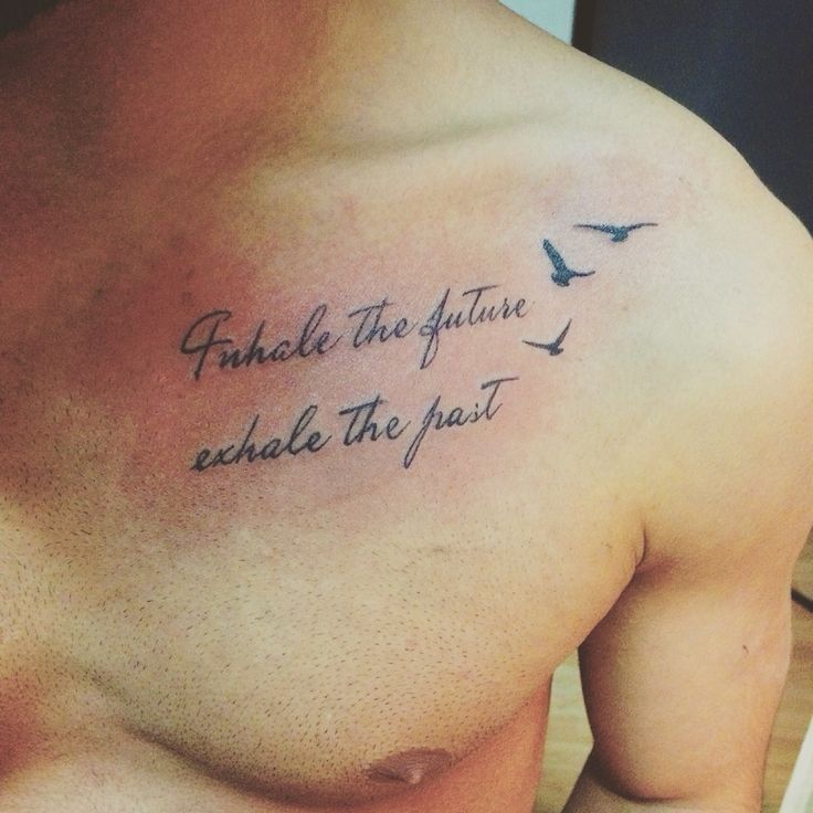 a man with a tattoo on his chest that says, frolick the future echale the past