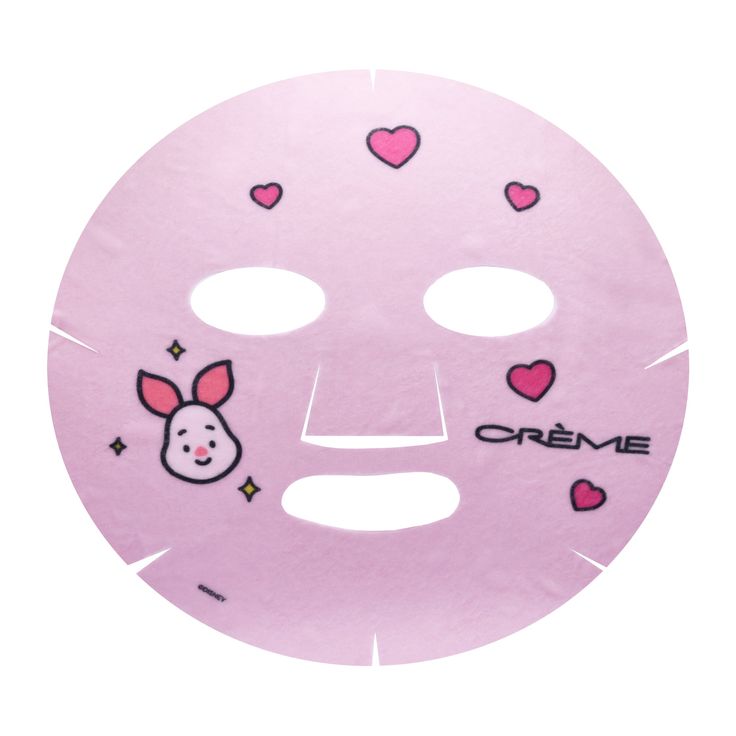 a pink mask with hearts on it and an animal face drawn on the front side