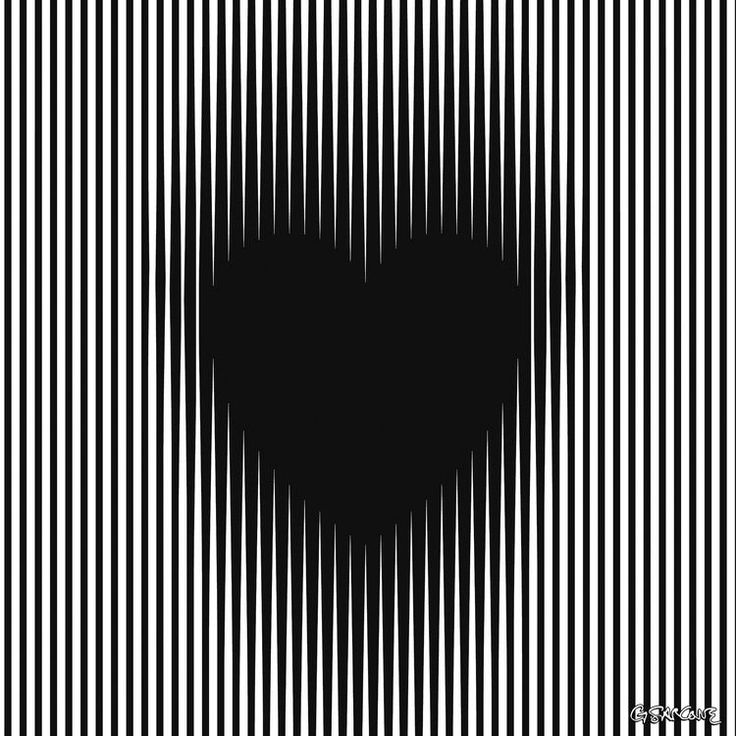 a black and white heart shaped object in the middle of a striped pattern with vertical lines