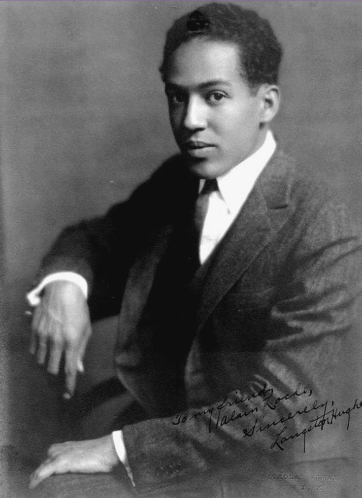 an old black and white photo of a man in a suit