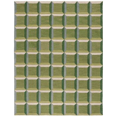 an area rug with green and white squares on the side, in front of a white background