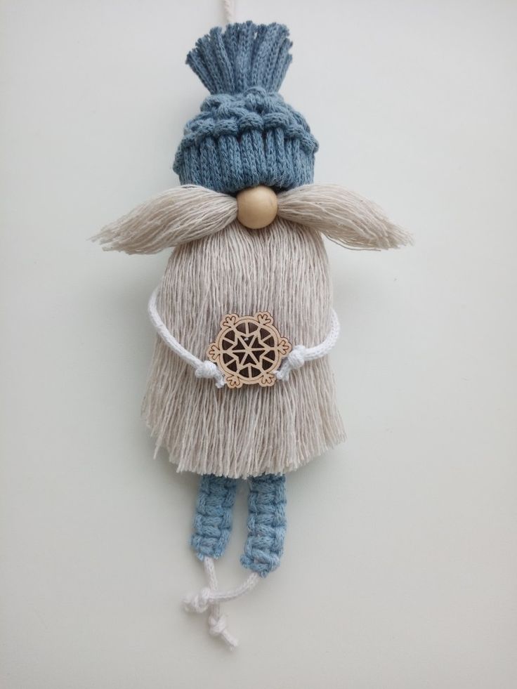 a knitted ornament hanging on the wall