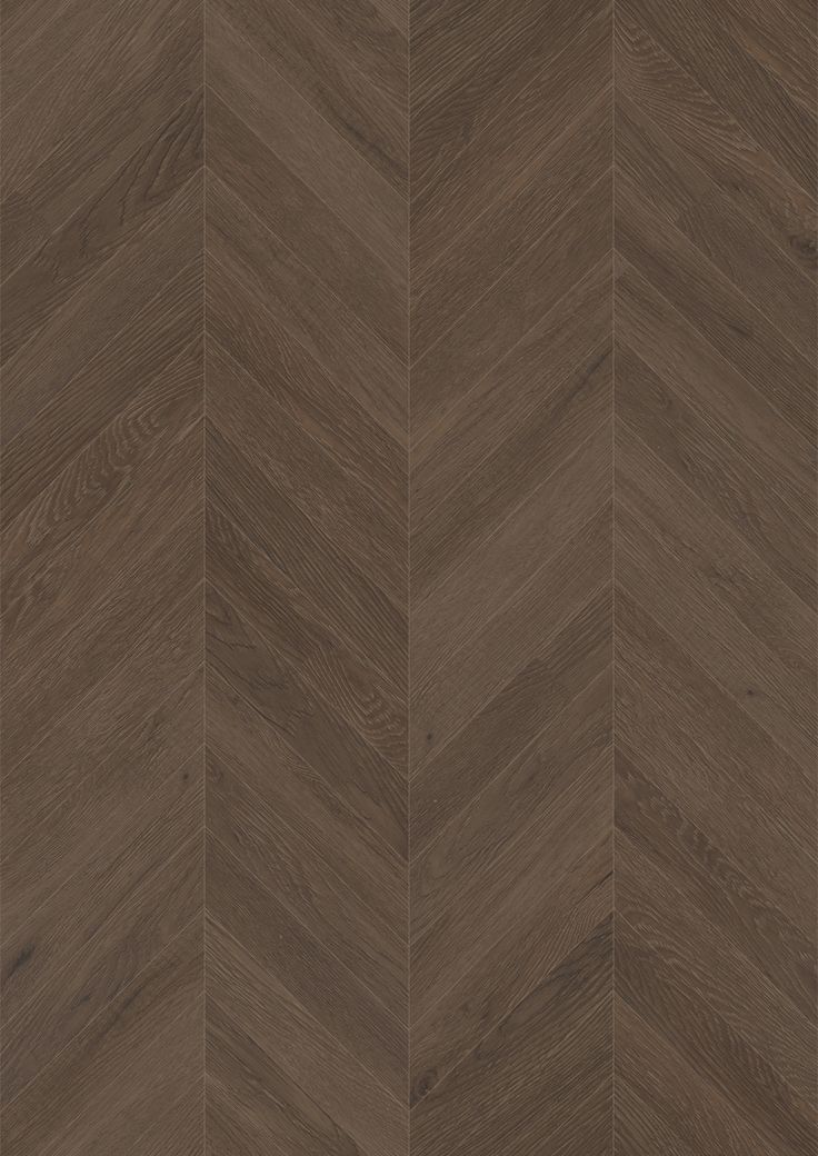 an image of wood flooring that looks like chevroned herringbones in dark brown